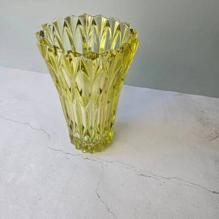 Large Czech vase in pressed glass, tinted yellow with geometric shapes.