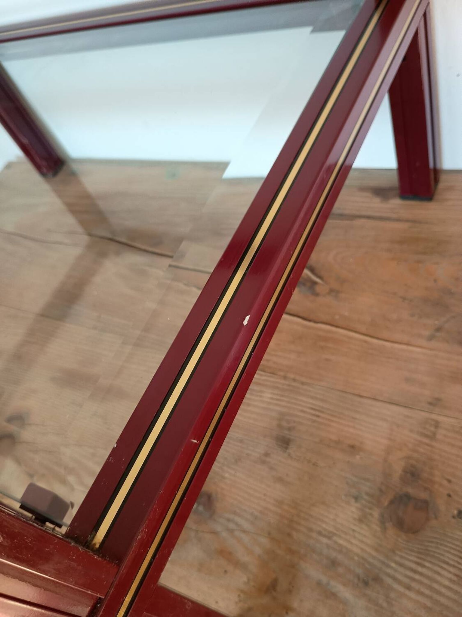 Side table in glass and brass