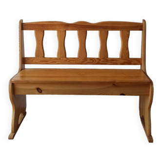 Wooden bench in a country style.