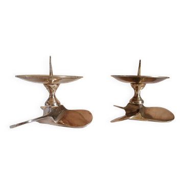 Two brass aviation propeller candle holders