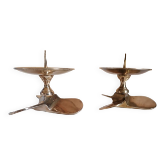 Two brass aviation propeller candle holders