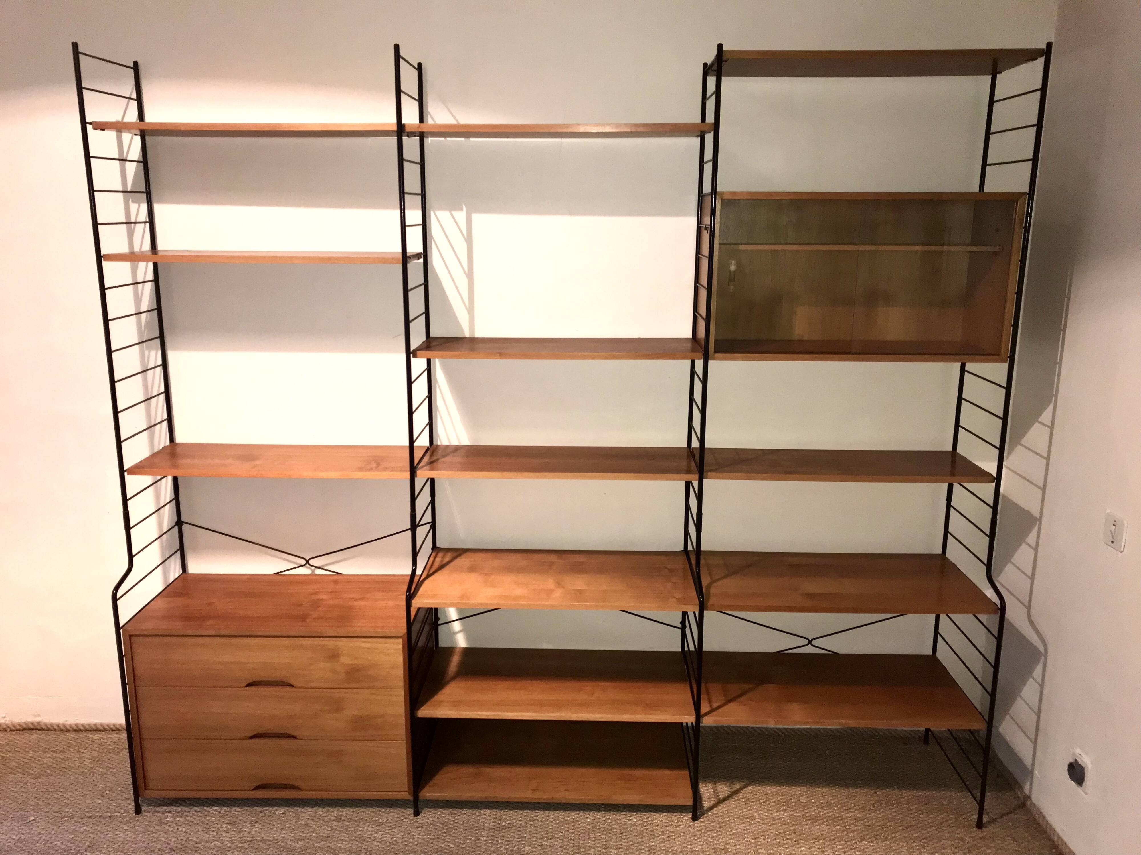 Vintage modular wall-mounted library shelf in blond walnut 1960-80