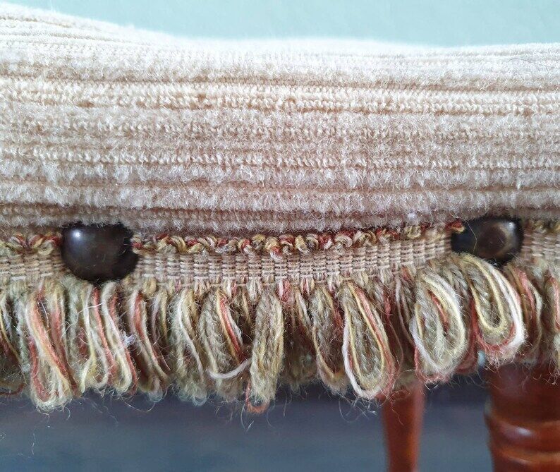 Wooden footrest with fringed fabric upholstery, 1970