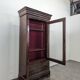 Louis Philippe period glass cabinet in flamed mahogany