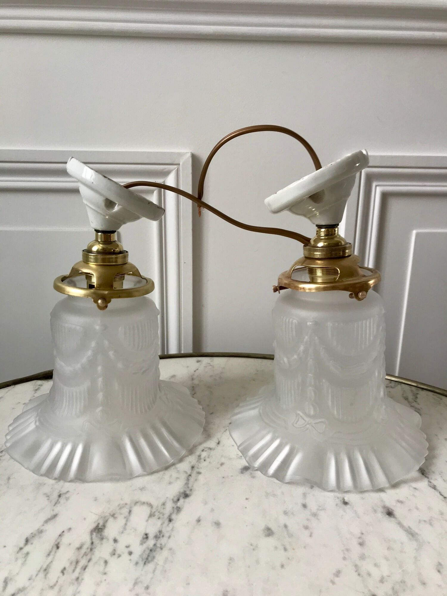 Pair of tulip wall lamps in molded glass on porcelain support 20s