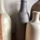 Set de 6 bouteilles de grès et terre cuite 1900-1930