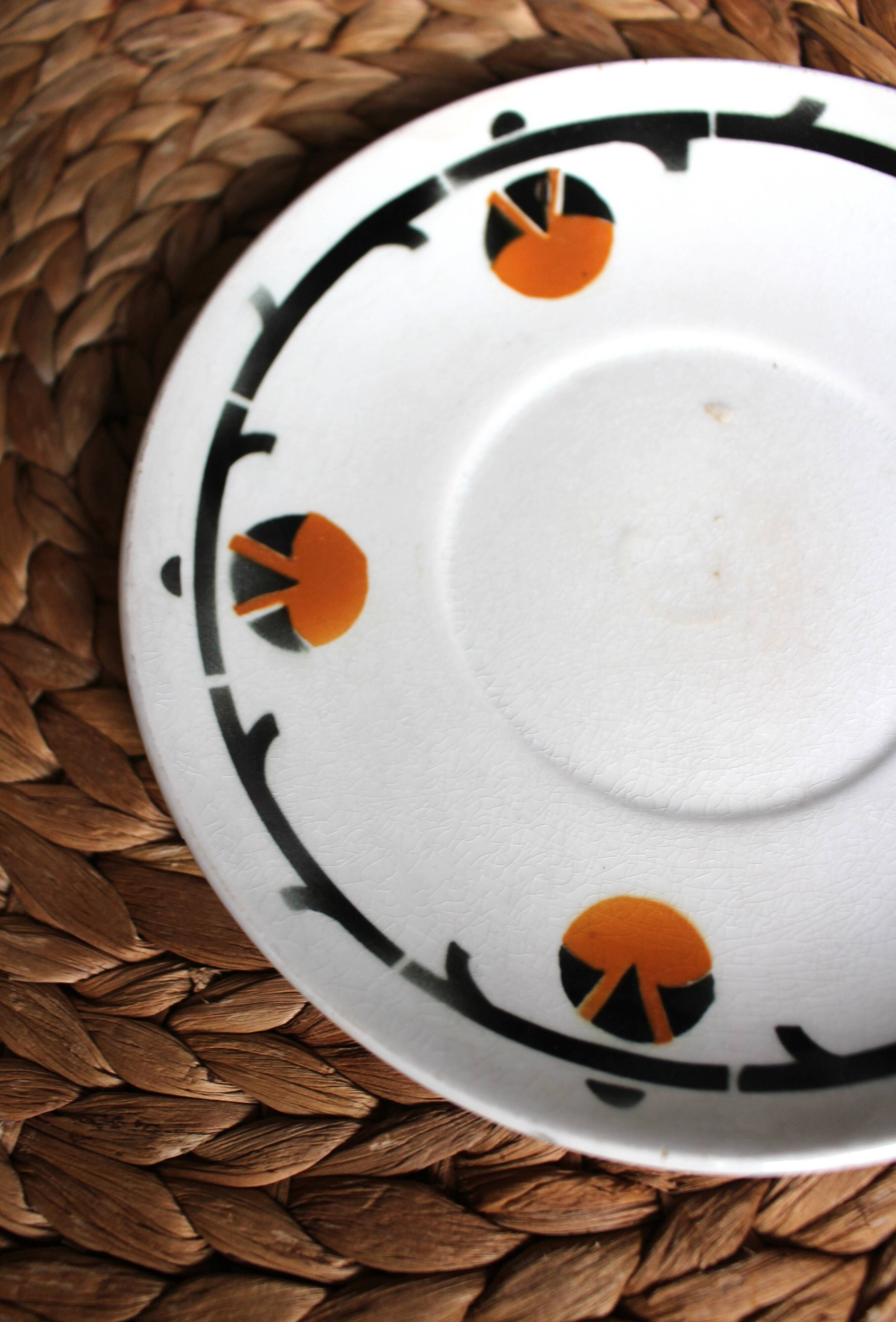 A large cup of chocolate tea, saucer Badonviller Barcarolle orange black.