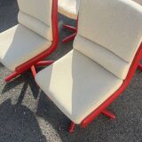 Set of 4 vintage 1970s swivel chairs in red and beige.