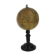 Globe on turned and blackened wooden base
