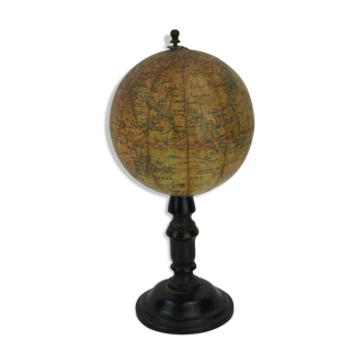 Globe on turned and blackened wooden base