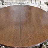 Round wooden table with 1 integrated extension + 6 wooden and fabric chairs