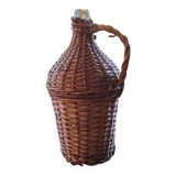 Glass demijohn encased in wicker, 1950s–1960s