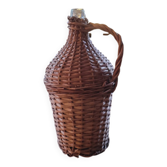 Glass demijohn encased in wicker, 1950s–1960s
