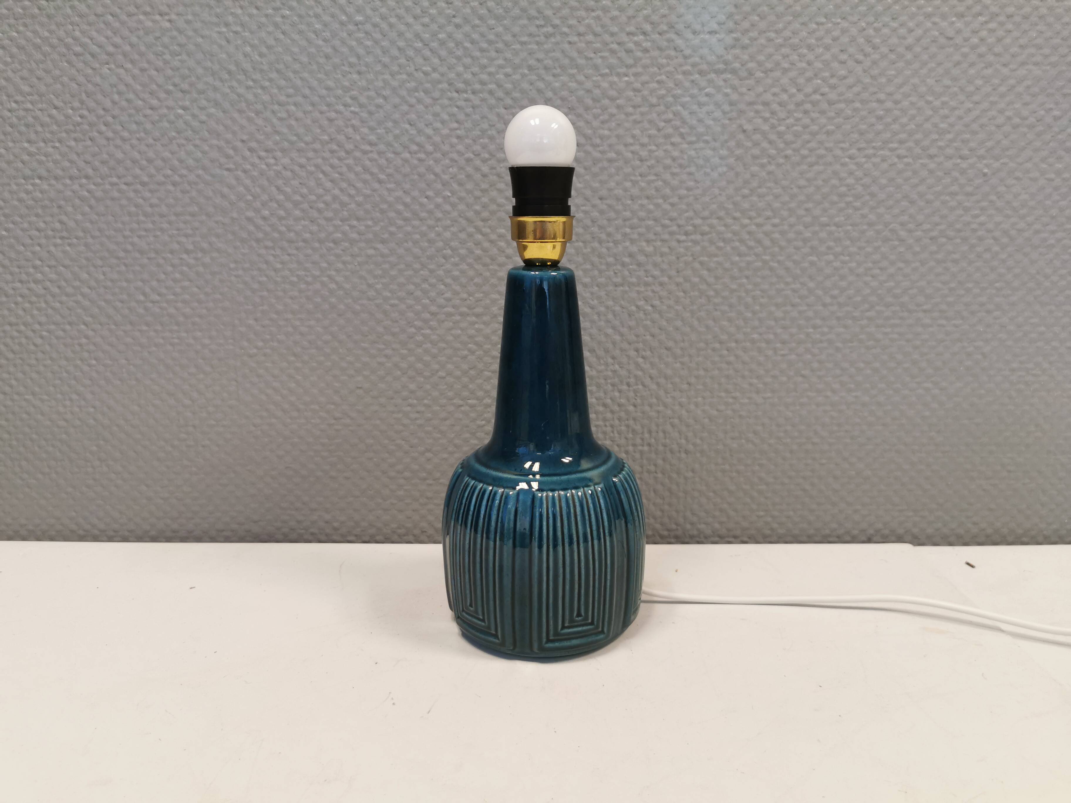 Elegant mid-century ceramic table lamp with an embossed pattern covered in mother-of-pearl glaze.