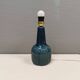 Elegant mid-century ceramic table lamp with an embossed pattern covered in mother-of-pearl glaze.