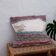 Handwoven cushion cover made from recycled cotton