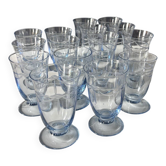 Set of 32 vintage glacier blue engraved stemmed glasses.