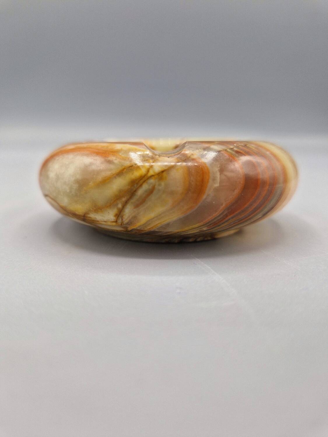 Small vintage onyx ashtray with three rests