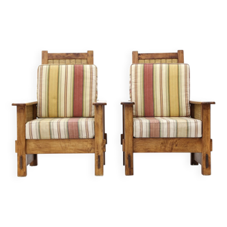 Set of South African colonial armchairs in wood and straw, 1980s.
