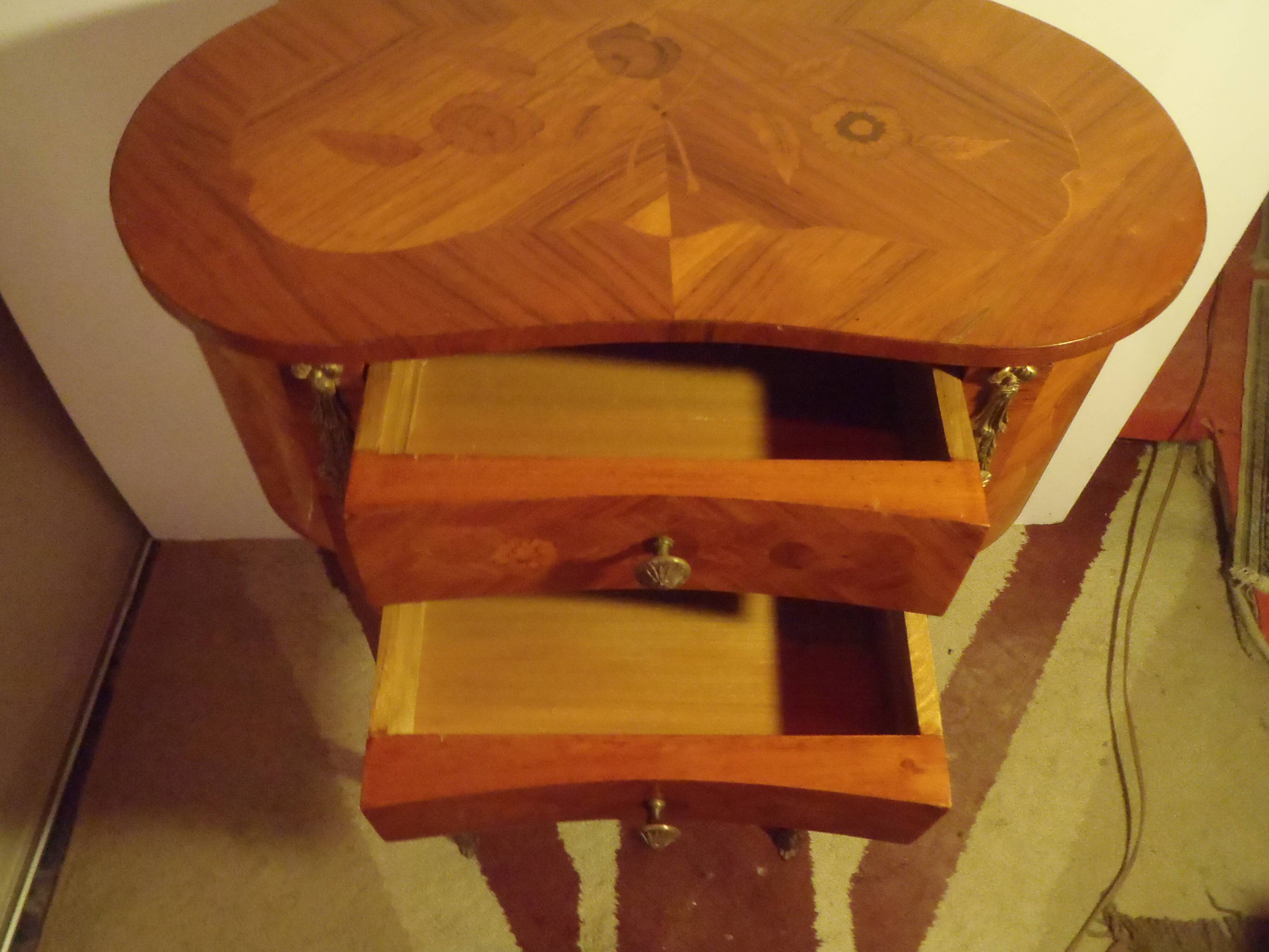 Louis XV style bedside table with varnished marquetry.