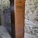 French antique wardrobe with curtain in oak, circa 1920–1930.