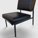 Modernist armchair in black faux leather and metal – 1960s