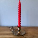 Old copper hand-held candlestick