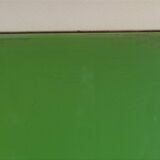 1960s side table with a lime green top, width 65.5 cm.