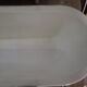 Cast iron island bathtub, on eagle-begged feet