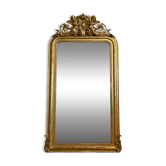 Louis Philippe mirror with a pediment featuring winged putti.