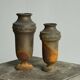 Pair of Art Deco vases in patinated metal
