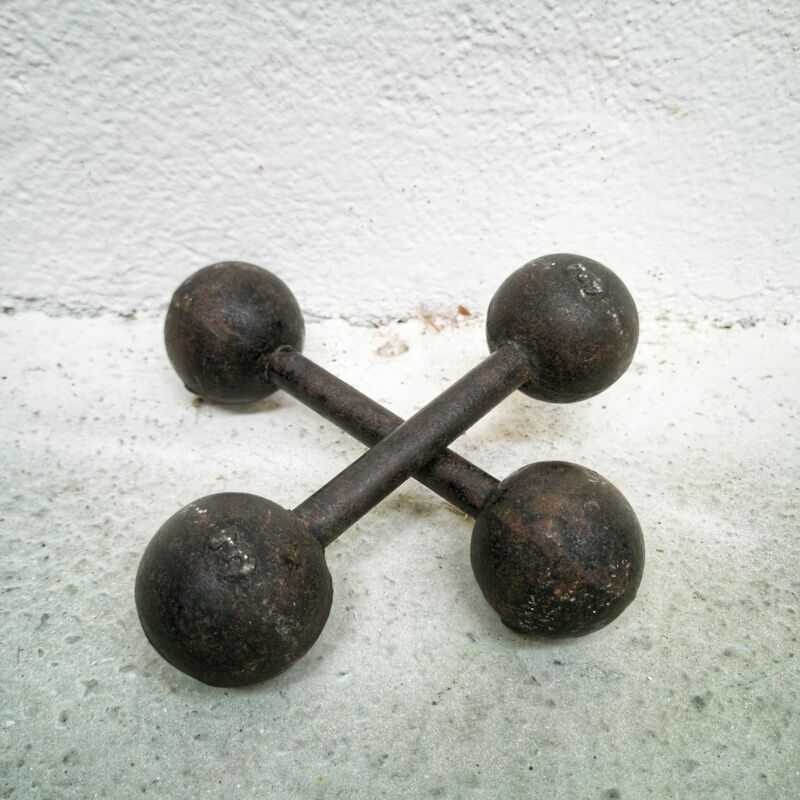 Pair of vintage cast iron dumbbells