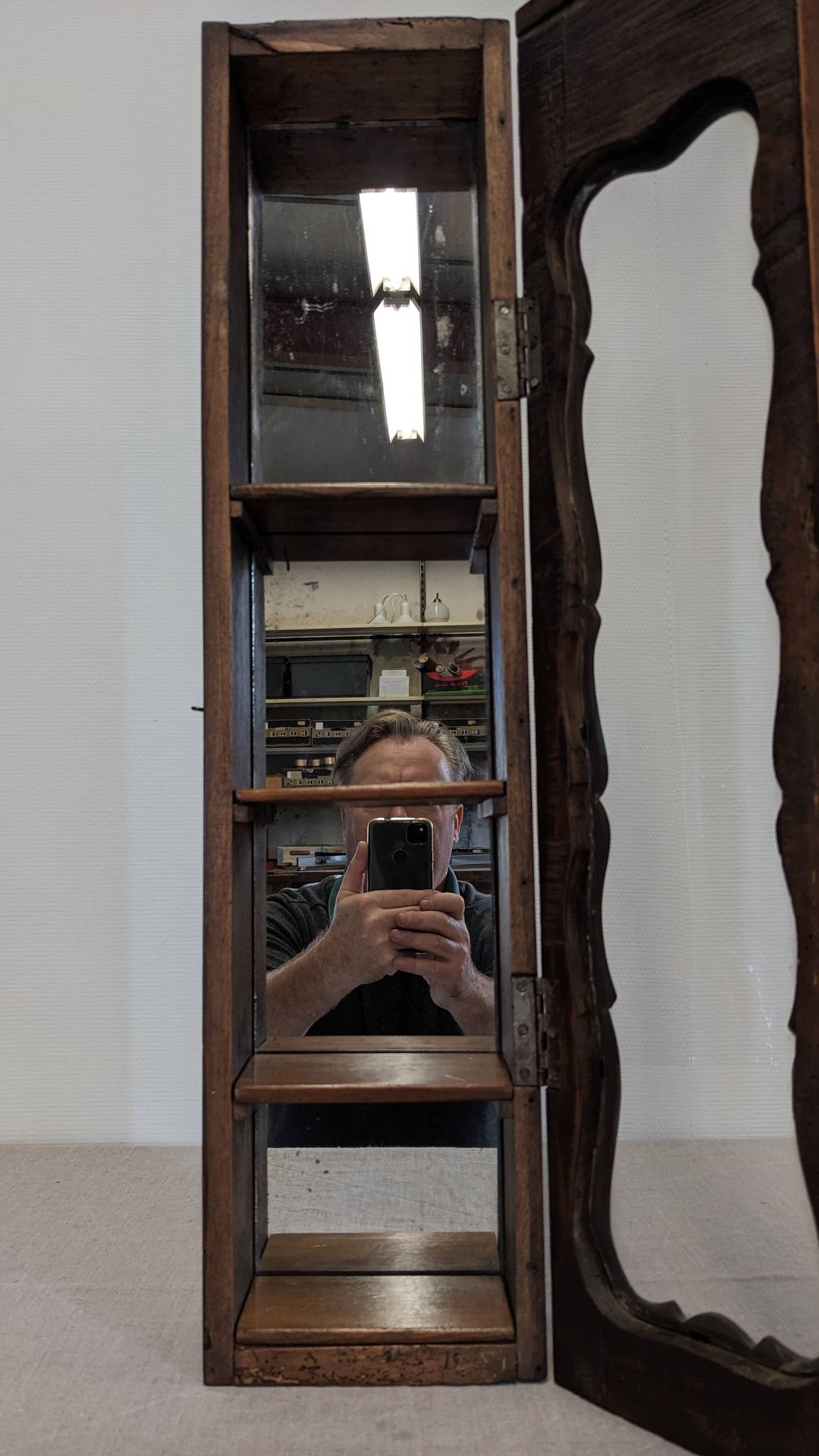 Louis XV style wall display cabinet in walnut, France mid-20th century.