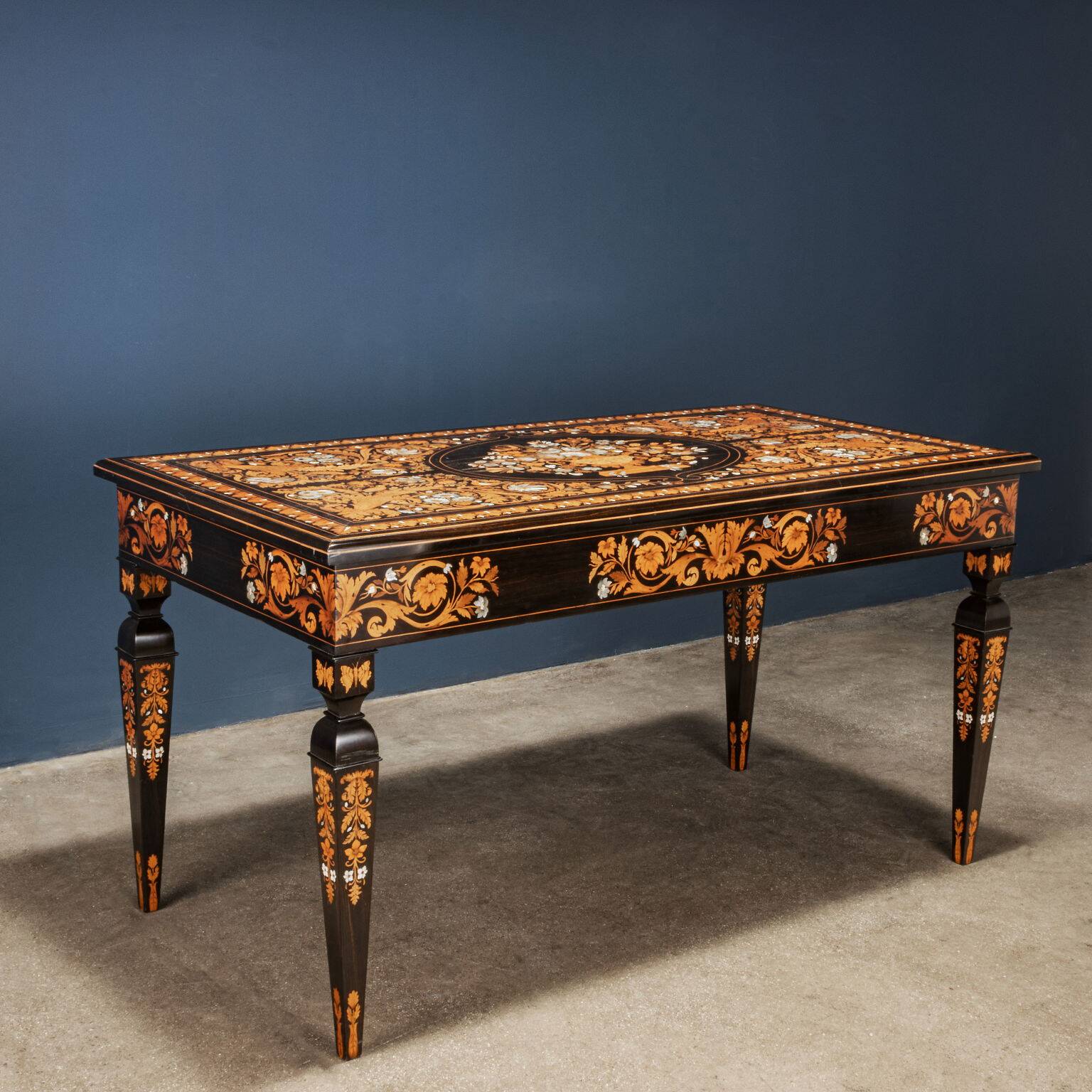 Antique table attributed to Luigi and Angiolo Falcini in chestnut wood, Italy, 19th century.
