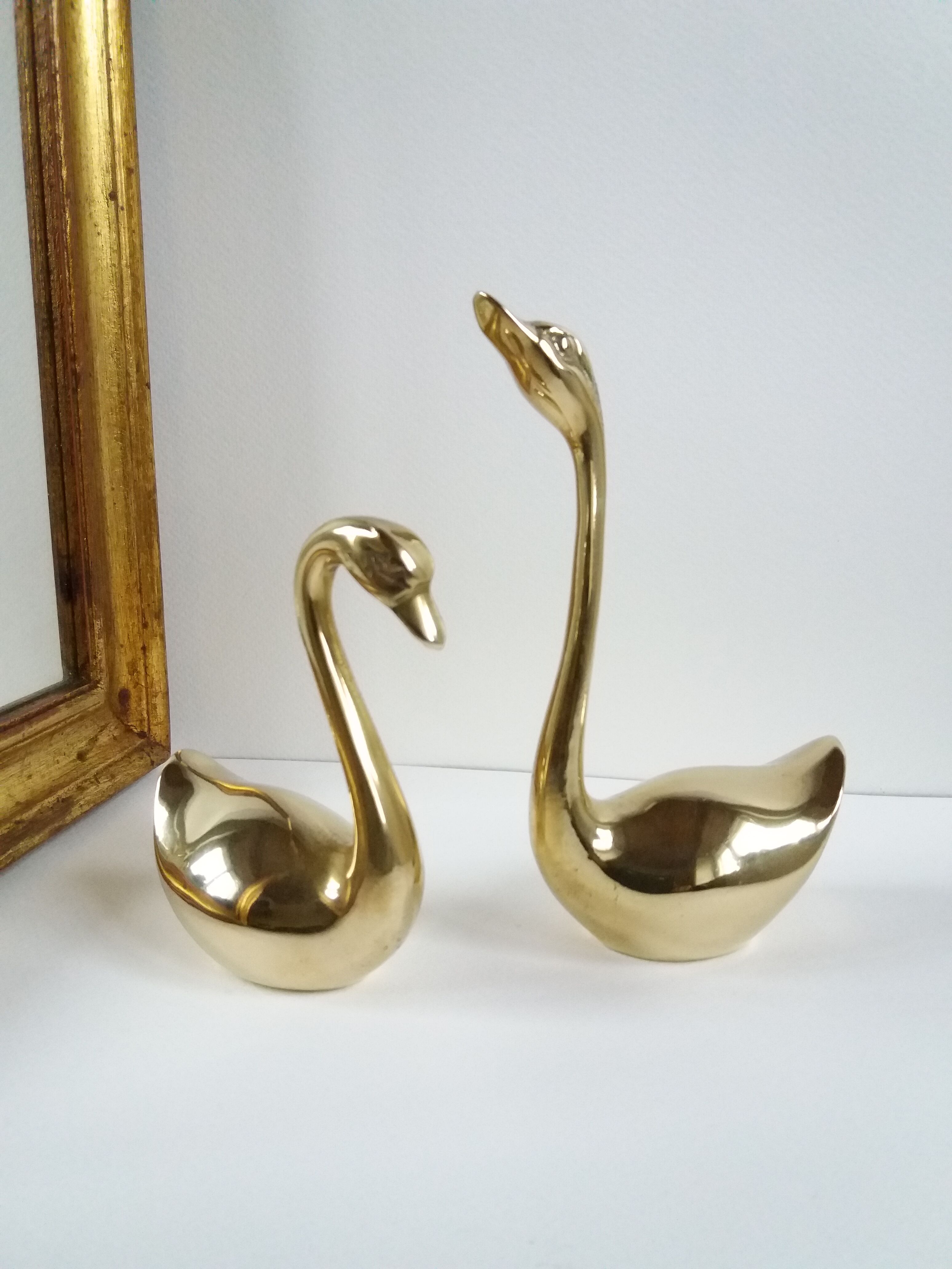 Couple swans brass