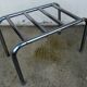Hotel luggage rack, in chrome steel. The 50's