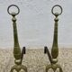 Pair of Neo-classical andirons, in solid bronze, 1920s-1930s.
