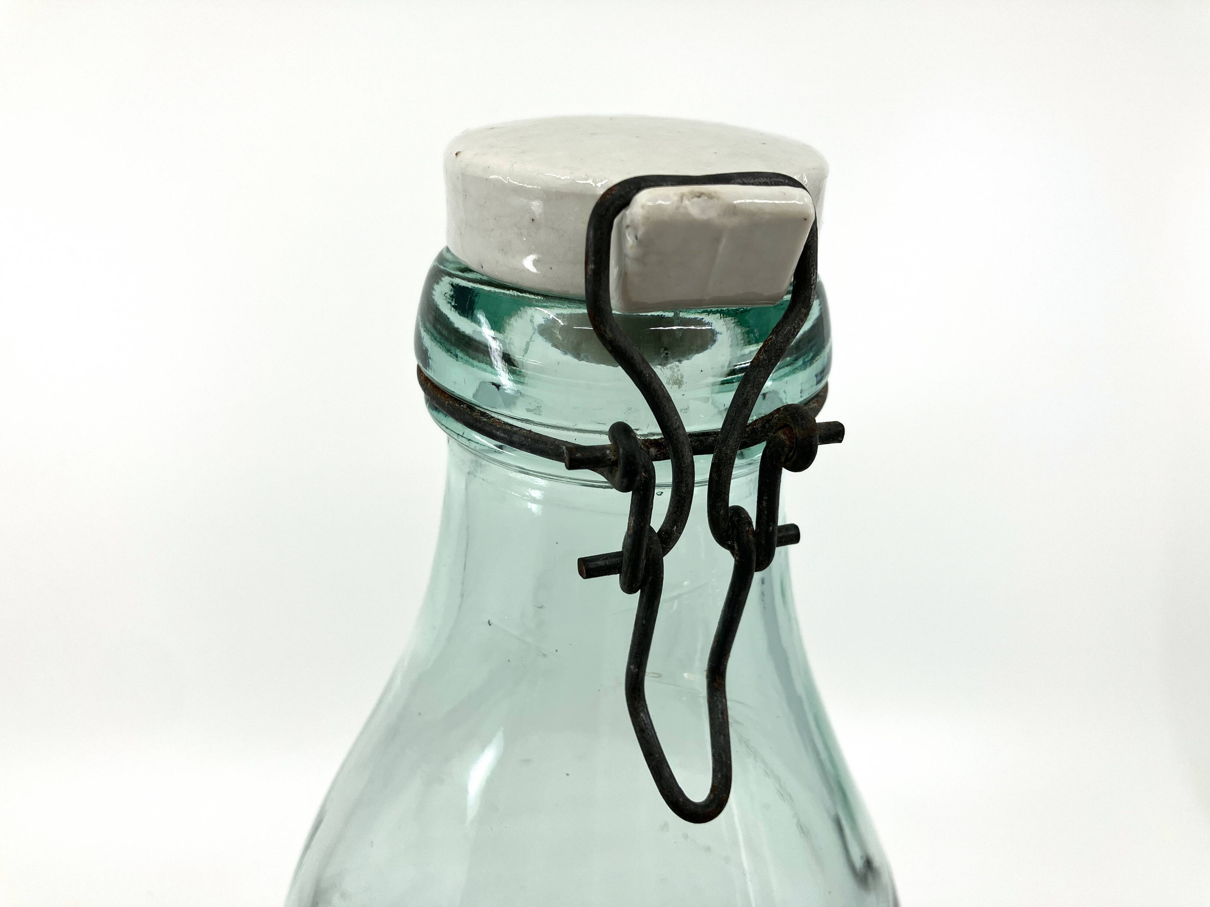 Large "Mercur" glass bottle with ceramic stopper • 2L • 1930