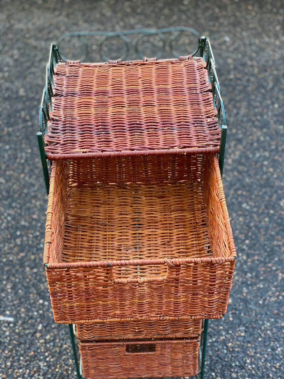 Metal chest of drawers and four woven wicker baskets