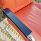 Orange leather cantilever tubular armchair