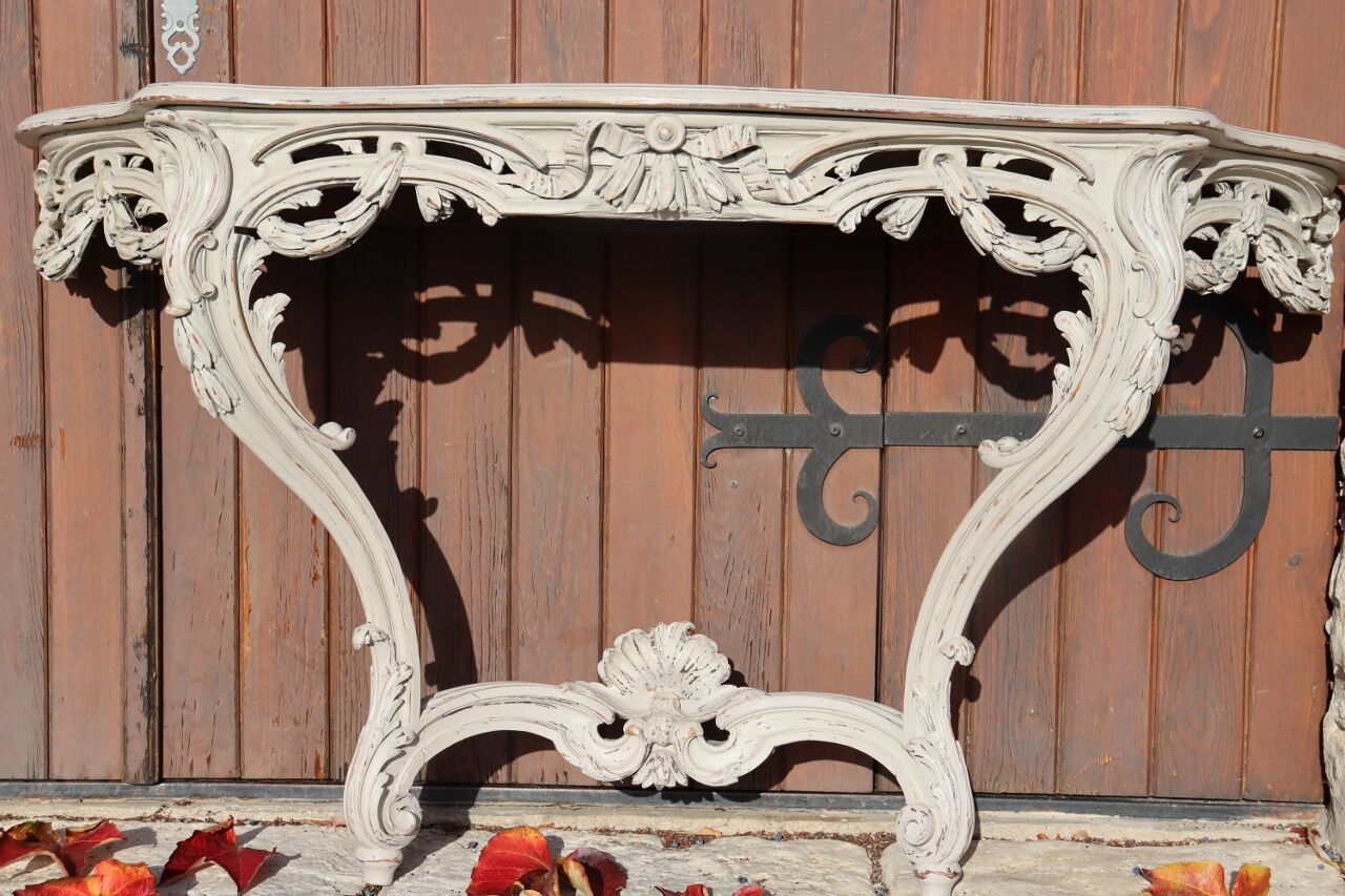 Carved wooden console