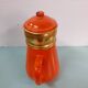 Orange enamelled sheet maker