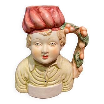Anthropomorphic beer mug to the young boy in porcelain biscuit