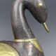 Wooden and brass swan