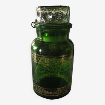 Green carafe with gold patterns