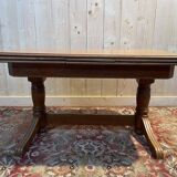 Oak dining table with integrated extensions
