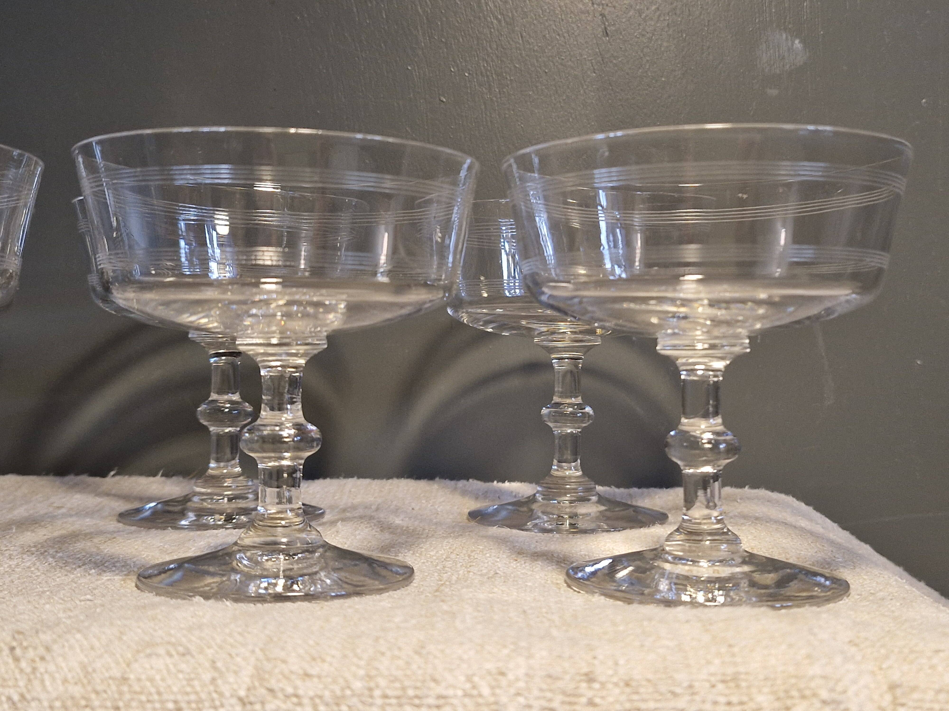 7 crystal champagne coupes from Baccarat - engraved with fillets