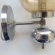 Pair of chrome metal wall lights with vintage sandblasted glass globes