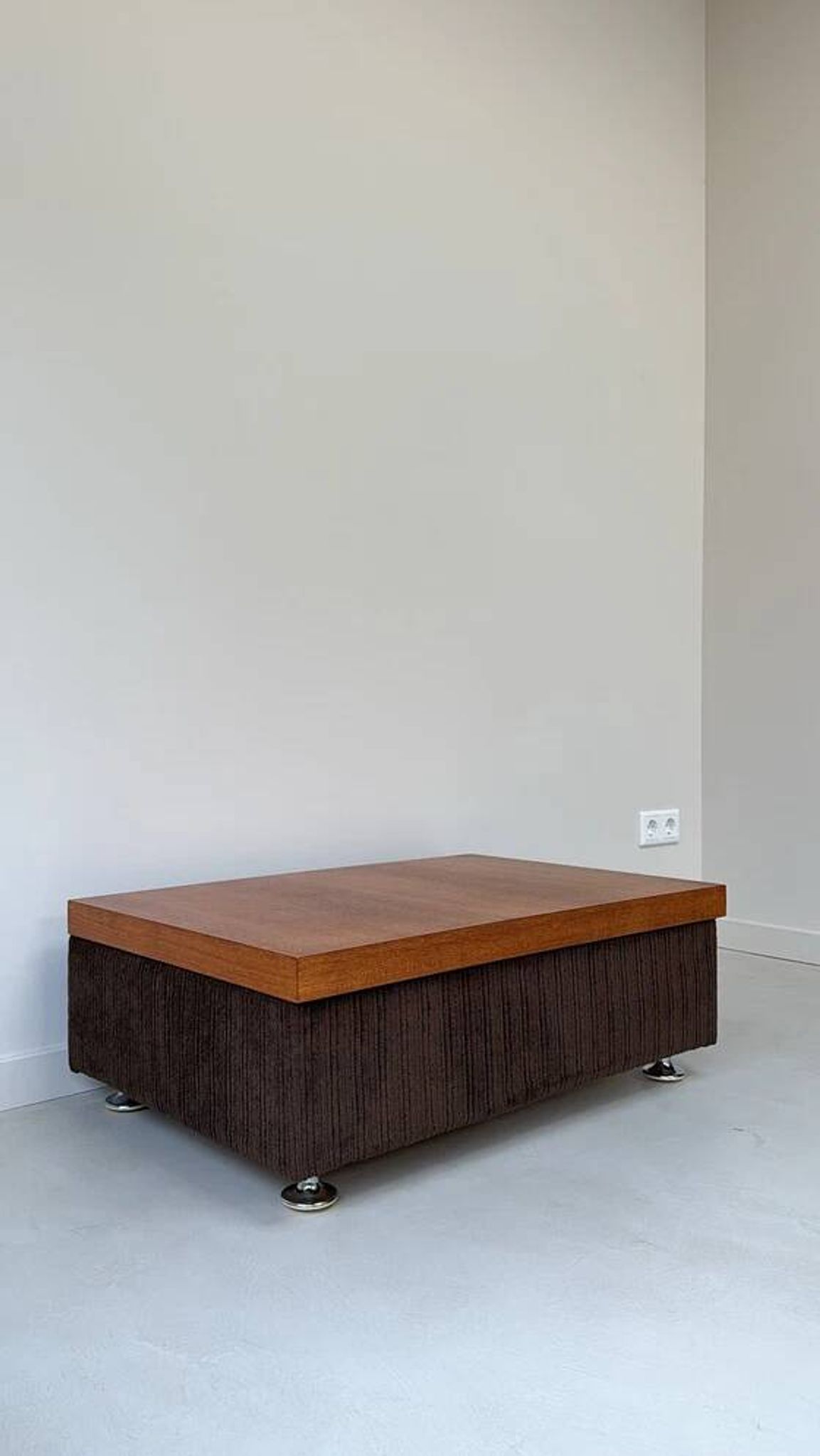Coffee table with brown corduroy fabric, wooden top and chrome legs