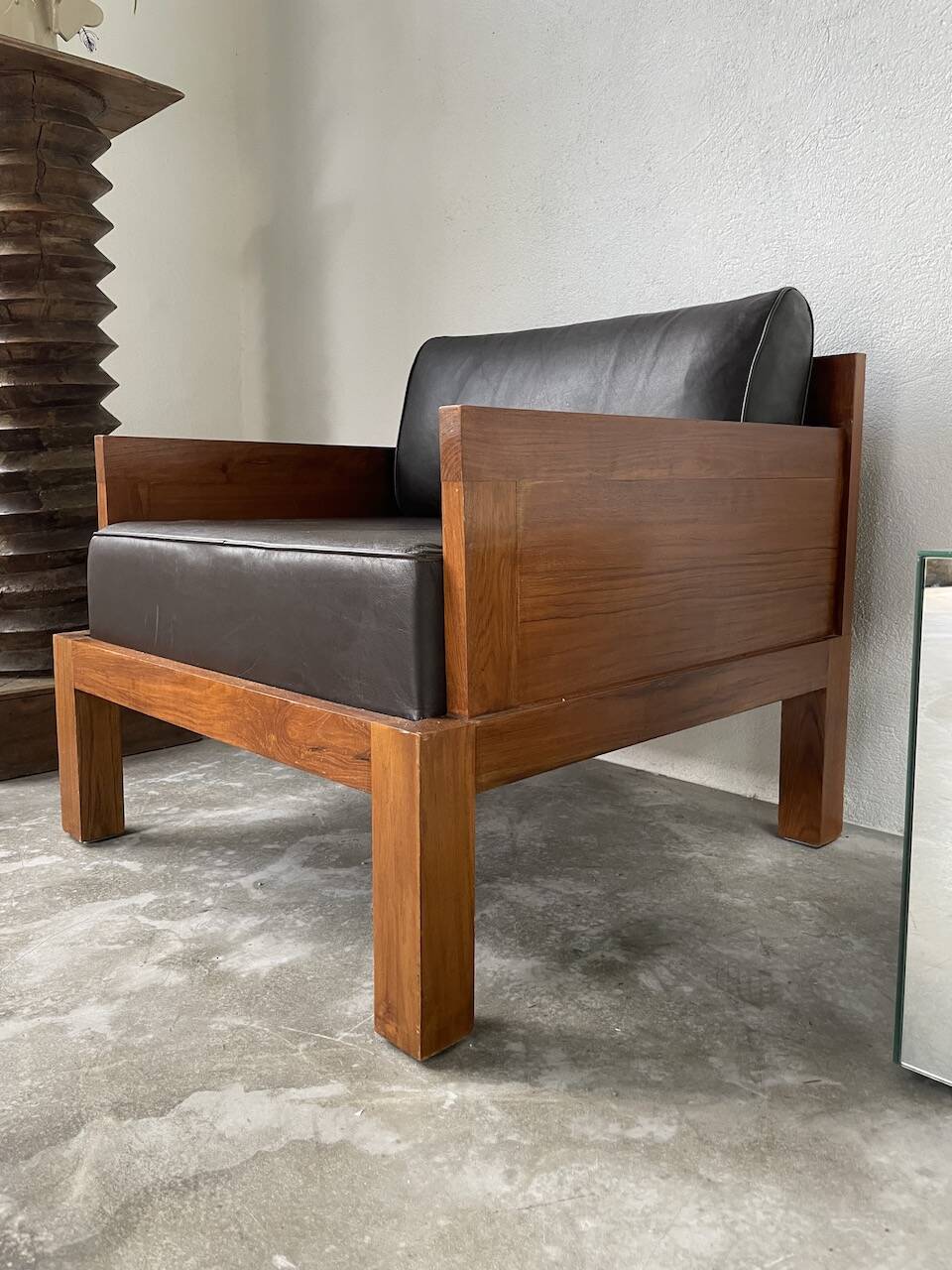 Modernist armchair in exotic wood and leather